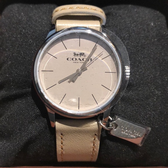 Beige leather watch from coach.